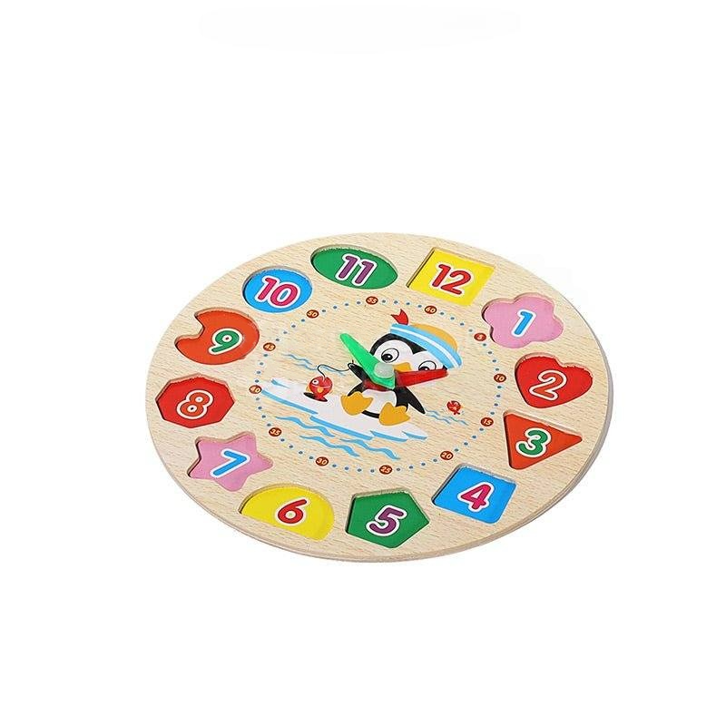 A Montessori Penguin's Clock puzzle for children, featuring numbers 1 through 12 in bright colors and a cartoon penguin in the center holding ski poles. This InvenToy enhances learning and development through play.