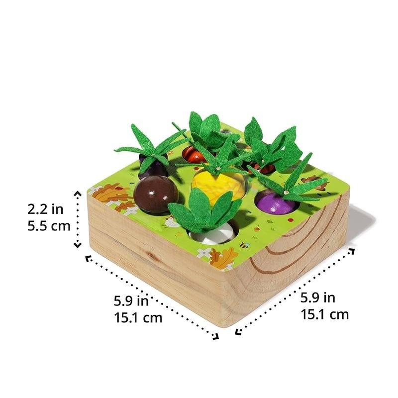 A wooden InvenToy Montessori Vegetable Set shaped like a square box, featuring cut-outs with various colorful fruits and leaves, each with a corresponding knob for easy handling. It includes dimension markings.