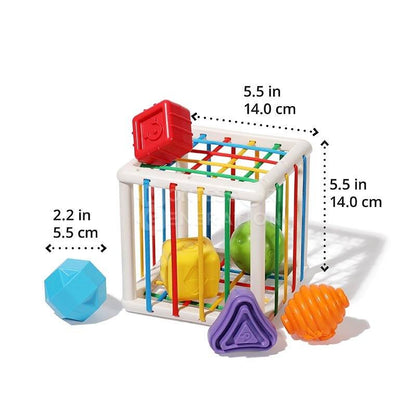 A colorful InvenToy Montessori Shape Blocks with shapes like stars and spheres outside, and dimensions of 5.5 inches by 5.5 inches listed next to it.